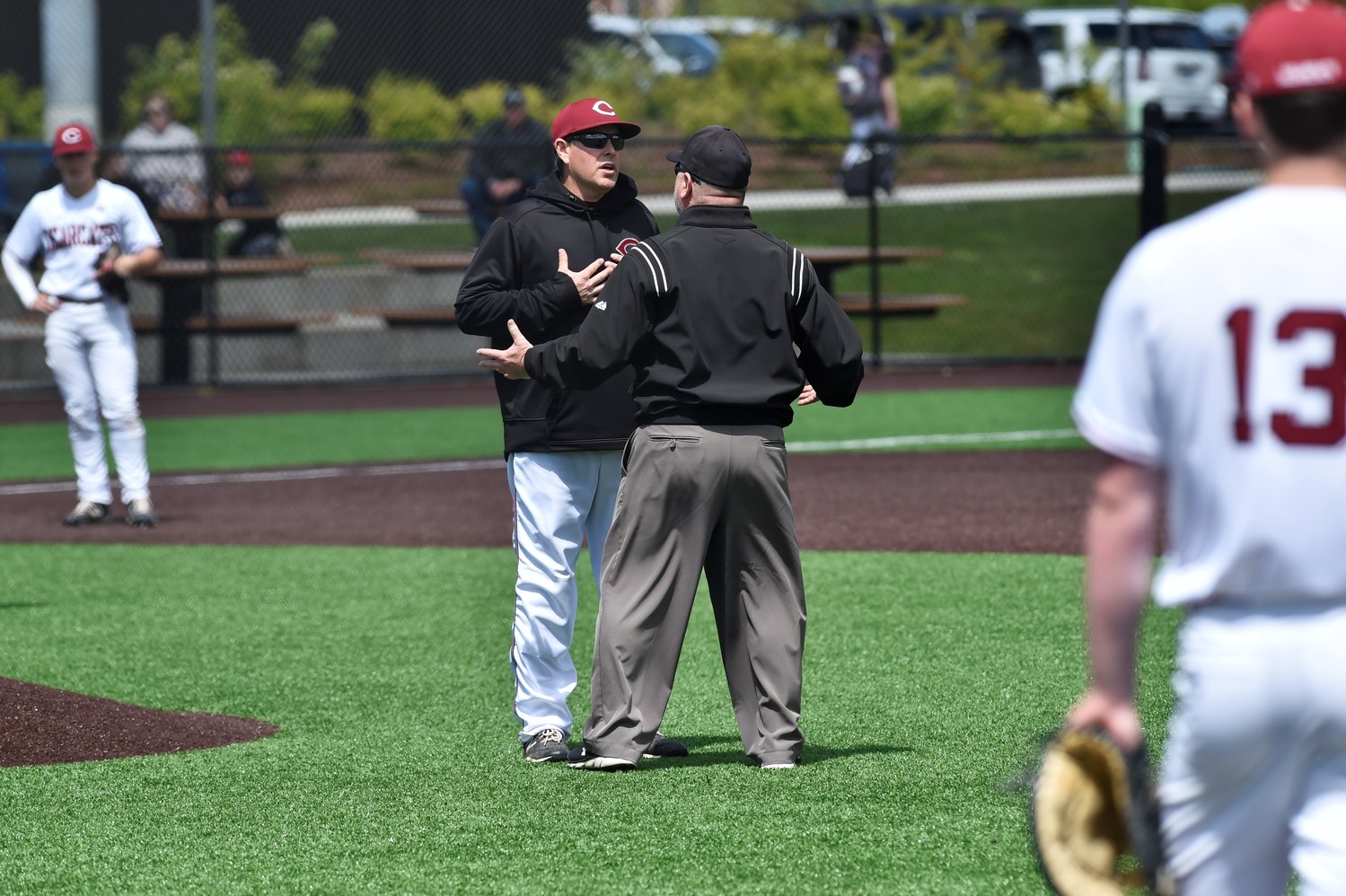 W.F. West coach Bryan Bullock argues a balk call but gets nowhere with the umpire in the fifth inning against Mark Morris in the 2A District 4 tournament May 14 in Ridgefield.